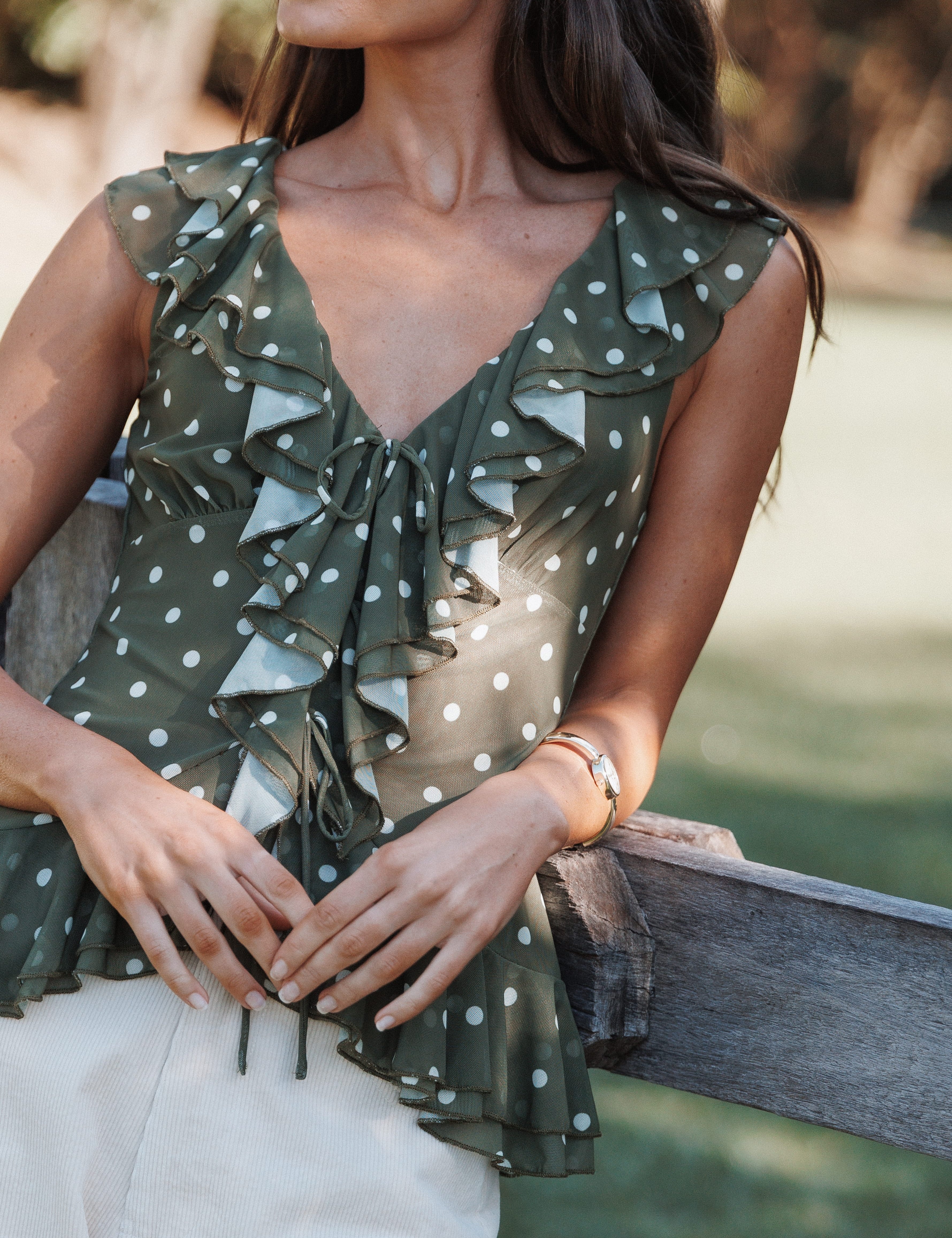tops-orelia-ruffle-front-top-olive-green-polka-dot-1255696189.jpg